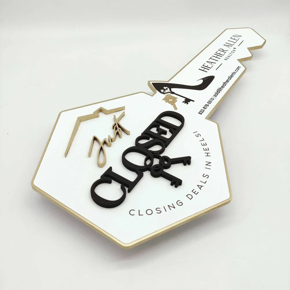 White Key-Shaped Sign "Closing deals in heels"